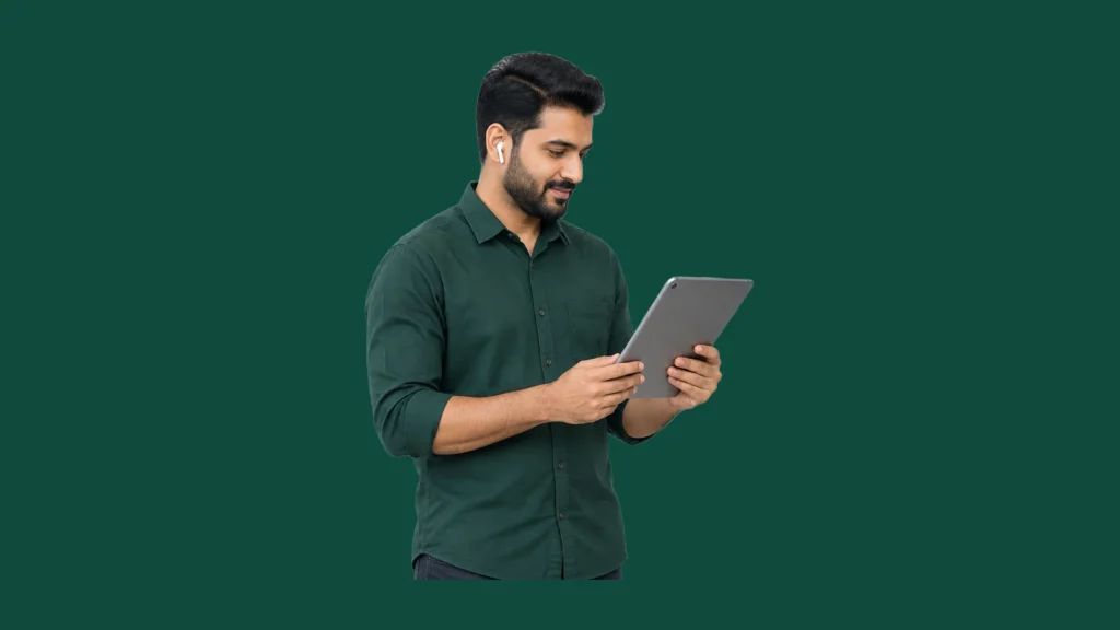 An adult learner holding a tablet